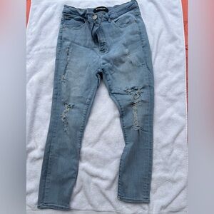Express super skinny ripped jeans